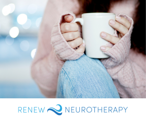 woman holding a coffee mug and engaging in relaxation