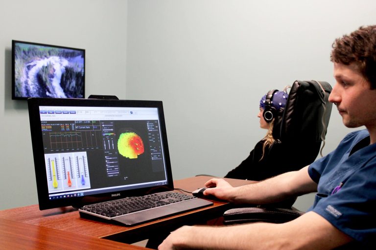two people in a neurofeedback session